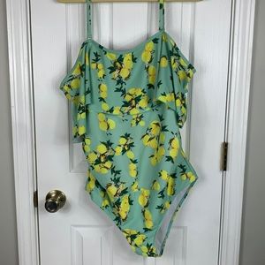 Mint green/ lemons 1 pc. Swimsuit size large. Adjustable straps/sleeves. Rushing
